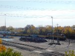Job 01 yard GP60s tuck 6 wells of retired ties destined for recycling